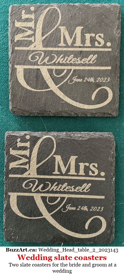 Two slate coasters for the bride and groom at a wedding